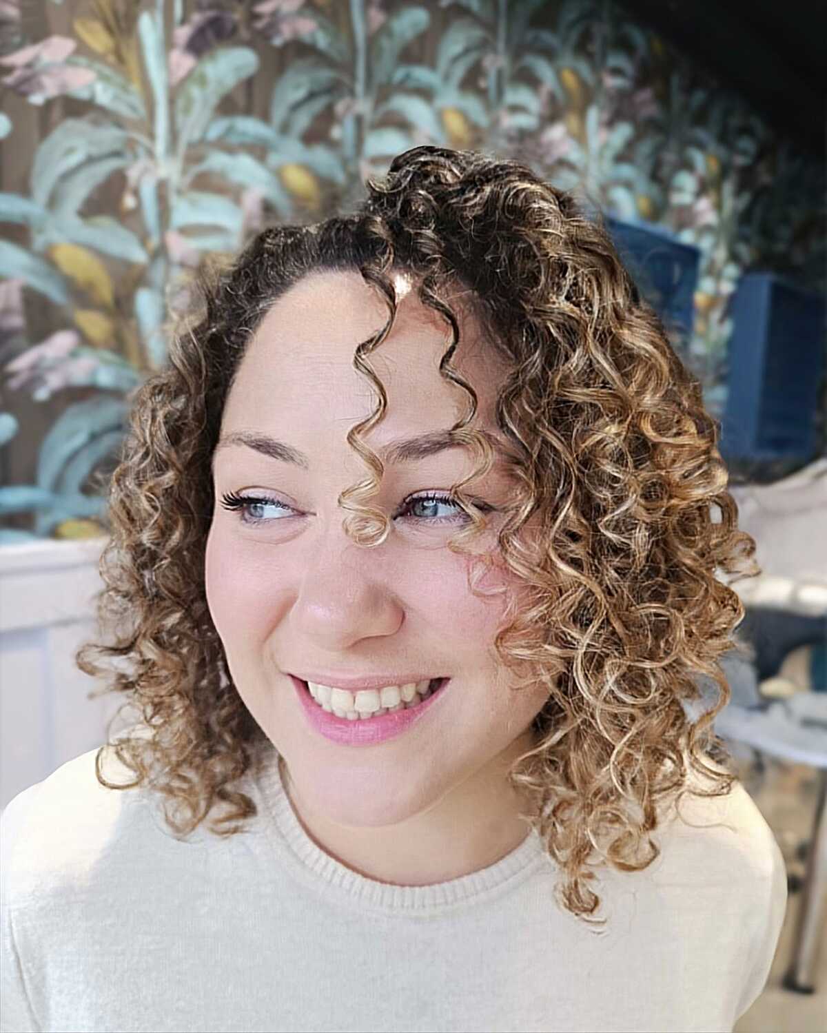 Playful Curly Cut with Textured Layers